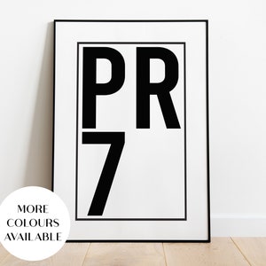 May include: Black and white framed print with the text "PR7" in bold, block letters.