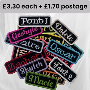 May include: A selection of embroidered name patches in various colours, each with a contrasting name or text. The patches are rectangular with a stitched border. Some patches include the text "Font 1" and "Font 2".