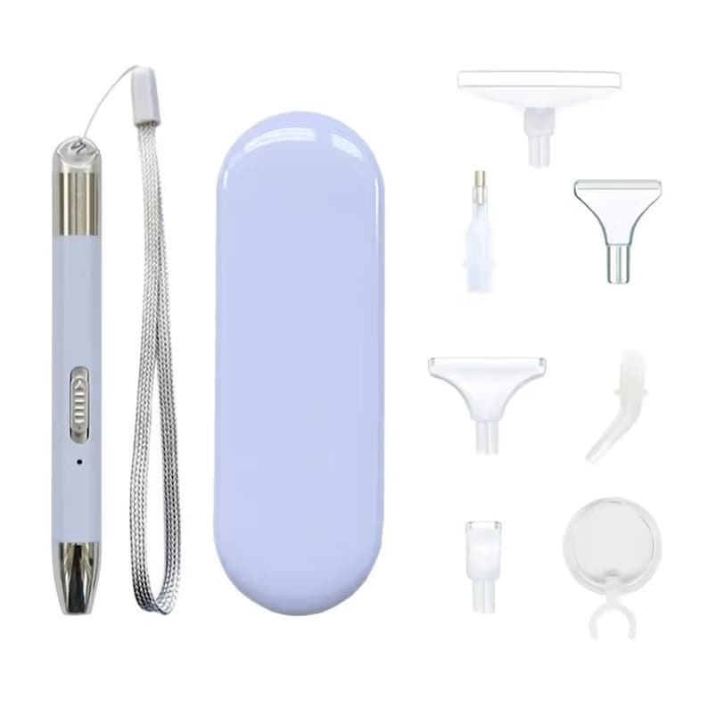 May include: A light blue diamond painting pen with a silver tip and a matching carrying case. The image also shows several white plastic diamond painting accessories, including trays and applicators.