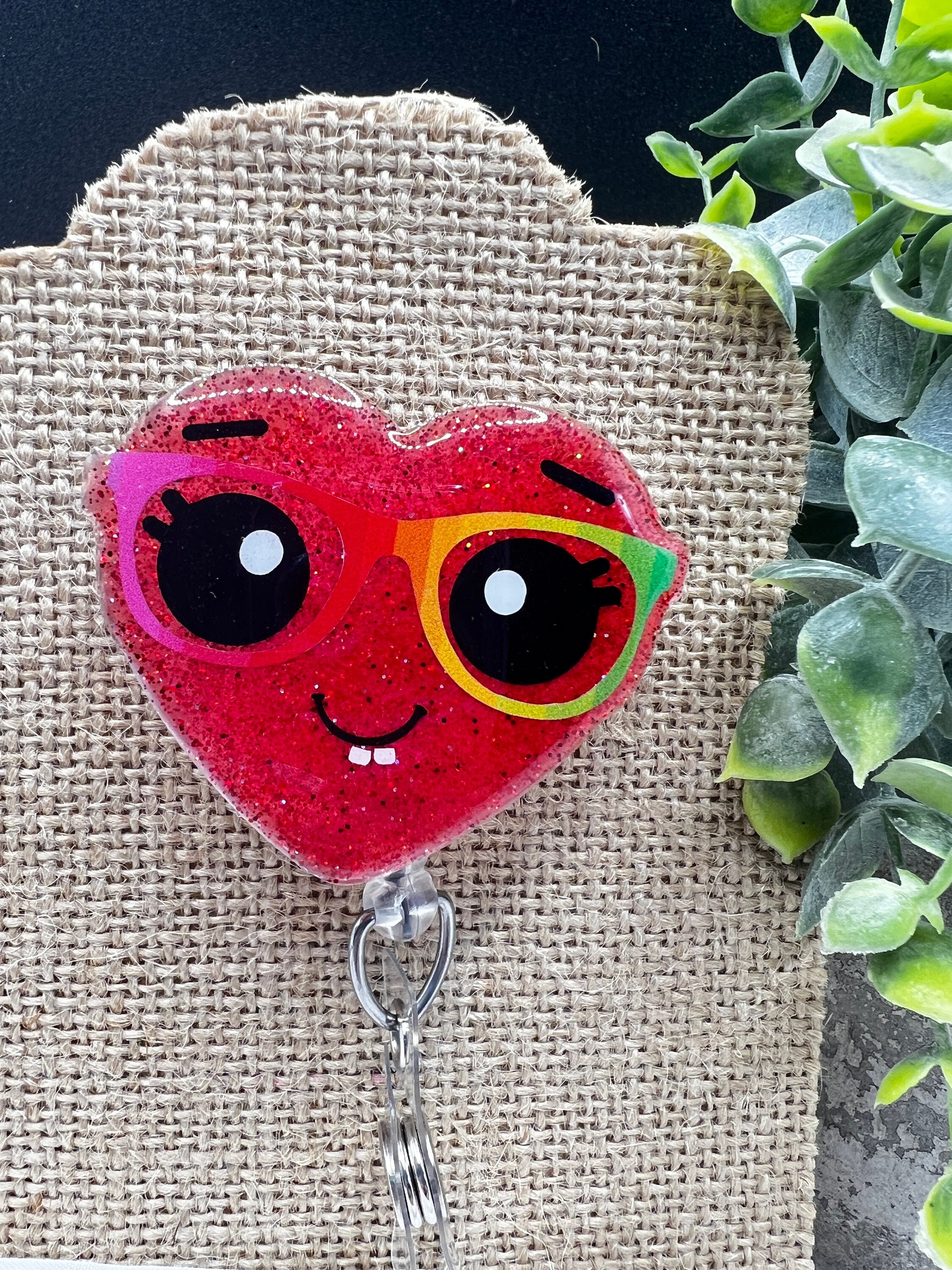 Silly heart-shaped face with glasses badge reel topper w/alligator clip or belt clip badge reel-nurse/teacher/medical/office