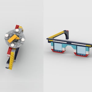 May include: A pair of 3D glasses made from LEGO bricks. The glasses are blue, red, yellow, and white. The lenses are clear plastic.