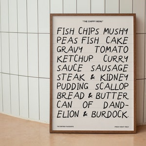 May include: A white framed poster with a handwritten menu for a chippy, or fish and chips shop. The menu lists classic chippy items like fish, chips, mushy peas, fish cake, gravy, tomato ketchup, curry sauce, sausage, steak and kidney pudding, scallop, bread and butter, and a can of dandelion and burdock.