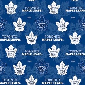 May include: A repeating pattern featuring the Toronto Maple Leafs logo and maple leaf designs. The logo and leaves are white on a dark blue background. The text "TORONTO MAPLE LEAFS" is also present.
