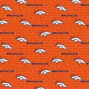 May include: Orange fabric with a repeating pattern of the Denver Broncos logo and the word "BRONCOS". The logo features a white horse head with a blue and orange mane. The background is filled with the word "BRONCOS".