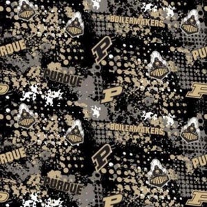 May include: A black, gold, and grey patterned design featuring the word "PURDUE" and the word "BOILERMAKERS". The design includes the letter "P" and the Purdue University logo. The background has a splatter effect.