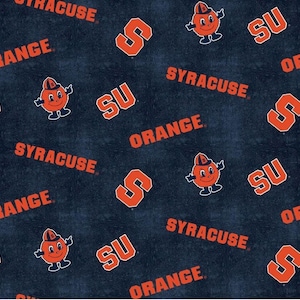 May include: Dark blue fabric with an all-over pattern featuring the word "SYRACUSE" in orange, the letter "S", the letters "SU", and a cartoon orange mascot. The design is repeated across the fabric.