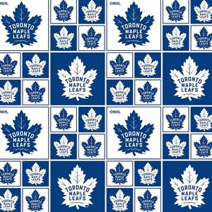 May include: A repeating pattern featuring the Toronto Maple Leafs logo. The design includes a white maple leaf and the text "TORONTO MAPLE LEAFS" on a blue background, with smaller logo variations.