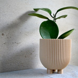 "Blumentopf ""Bowl"" mit Naturholzoptik."