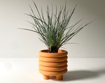 Fioriera per interni "COILED PLANTER" arancione con finitura opaca della metà del secolo