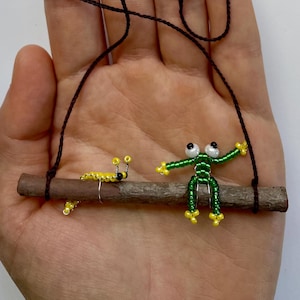 Frog and Slug Friends on a Swing