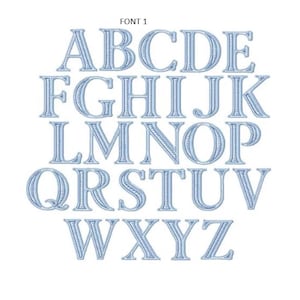 May include: The text FONT 1 appears above a complete set of uppercase English alphabet letters from A to Z. Each letter is rendered in a light blue color with a distinct embroidered stitch texture and a dark blue outline border.