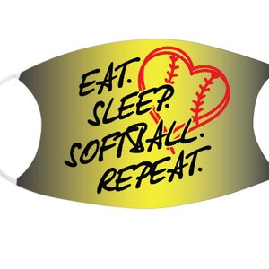 May include: A yellow and black face mask with a red softball in a heart shape. The text on the mask reads "Eat. Sleep. Softball. Repeat."