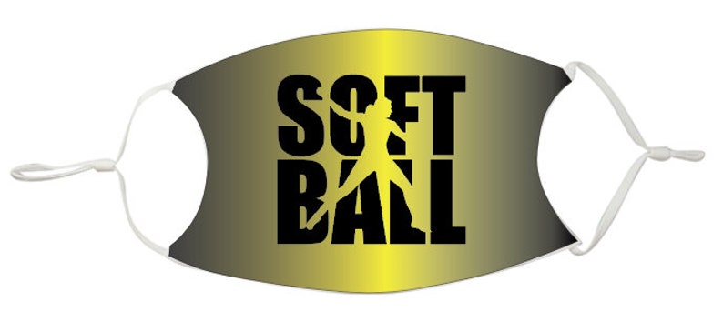 May include: A gold and black face mask with the word "SOFTBALL" printed in black letters. A silhouette of a softball player is in the middle of the word.