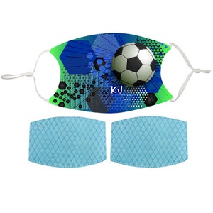 May include: A blue, green, and black face mask with a soccer ball graphic and the initials "KJ". The mask comes with two blue filter inserts.