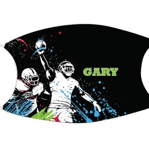 May include: Black face mask with a white design of two football players in action. The text "GARY" is printed in green on the mask.