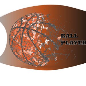 May include: A face mask with a white background and a brown to black gradient. A basketball with a geometric design is on the left side of the mask. The text "BALL PLAYER" is on the right side of the mask.