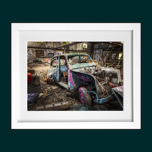 abandoned car in a bristol warehouse.