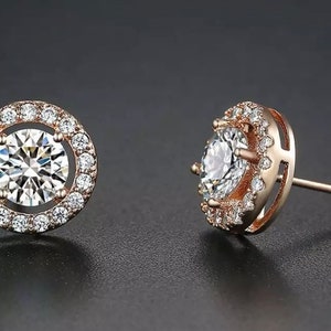 Stud Earrings In Rose Gold Cubic Zirconia Stone 1ct Main Stone With Border Of Smaller Stones Comes In Gorgeous Little Gift Box