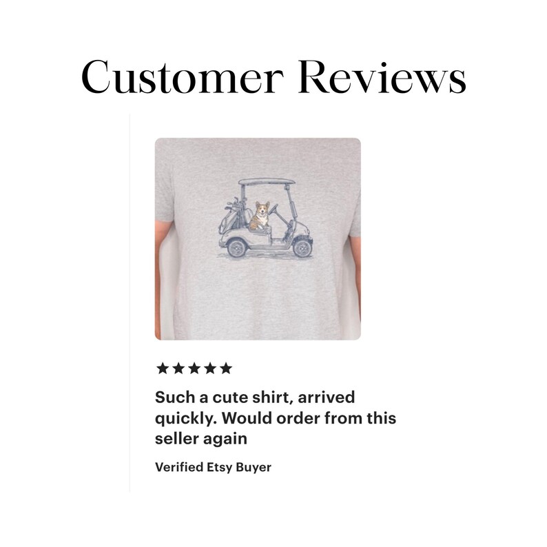 May include: A light gray t-shirt featuring a graphic illustration of a brown and white Corgi dog sitting in a golf cart with a golf bag in the back. The text Customer Reviews appears above the shirt, and a five-star rating is shown below it.