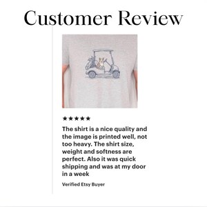 May include: A light gray t-shirt featuring a graphic illustration of a Corgi dog sitting in a golf cart with a golf bag in the back. The text Customer Review appears at the top, followed by five stars and a written review from a verified buyer.