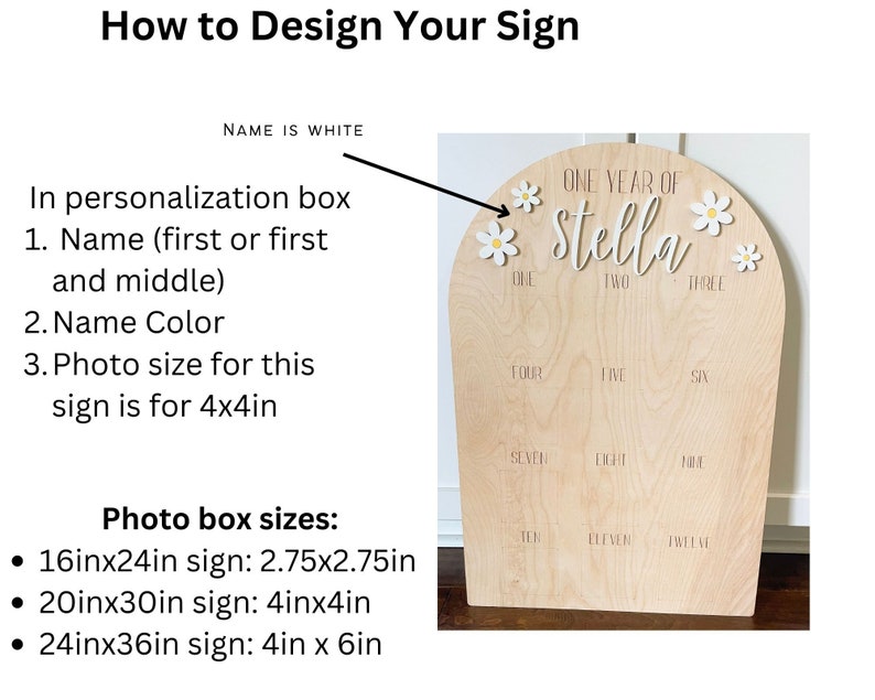 Puede incluir: Un letrero de madera con la parte superior redondeada y un dise&ntilde;o de margarita blanca. El letrero dice "One Year of Stella" y tiene una cuadr&iacute;cula de 12 cuadrados con los n&uacute;meros del uno al doce. El letrero mide 4 pulgadas por 4 pulgadas.