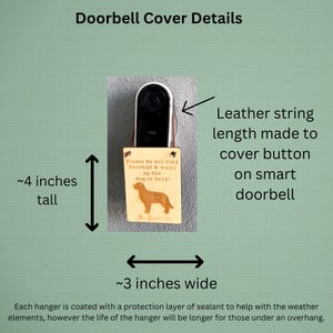 May include: Wooden doorbell cover, approximately 4 inches tall and 3 inches wide, with a dog illustration and the text "Please do not ring doorbell & wake up the dog or baby!". The cover is designed to hang on a smart doorbell.