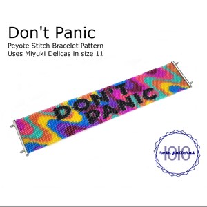 May include: A colourful beaded bracelet displaying the words "DON'T PANIC". The bracelet has an abstract design in blue, yellow, pink, and green. It is made with size 11 Miyuki Delicas beads. The bracelet measures approximately 2.5 cm wide.