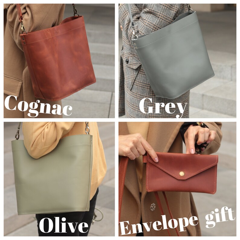 May include: Four leather bags in different colors: cognac, grey, olive, and a smaller envelope style bag in cognac. The bags are all made of high-quality leather and have a simple, elegant design.