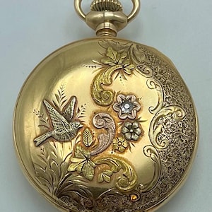 Antique 1902 Four Toned 14 Karat Gold Waltham Pocket Watch With A Single Rose Cut Diamond And Burd & Floral Motifs #DN TheShopsInUptown