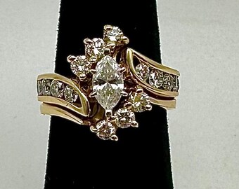 14 Karat Gold Ring With 16 Small Round Diamonds And A Single Marquise Cut Center Diamond / Ring Size 4 1/2 #DMT TheShopsInUptown
