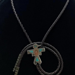 Artist Signed Navajo Handmade Brown Leather And Coin Silver Thunderbird Bolo Tie With Turquoise & Red Coral Inlay #ST25 TheShopsInUptown