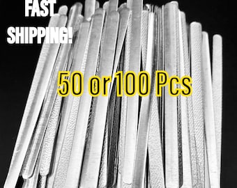 May include: A pile of 50 or 100 silver metal nose wire pieces for face masks.  The nose wires are about 5 inches long and have a slightly rounded end.