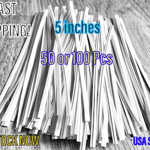 May include: A pile of white plastic nose wire for face masks. The wires are 5 inches long and are available in packs of 50 or 100 pieces.  FAST SHIPPING! IN STOCK NOW! USA SELLER
