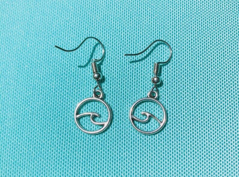 Silver dangle circular wave earrings