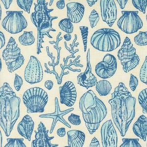 May include: A seamless pattern featuring blue and white seashells on a cream background. The pattern includes various types of seashells, including scallop shells, conch shells, and nautilus shells. There are also coral branches and a starfish.