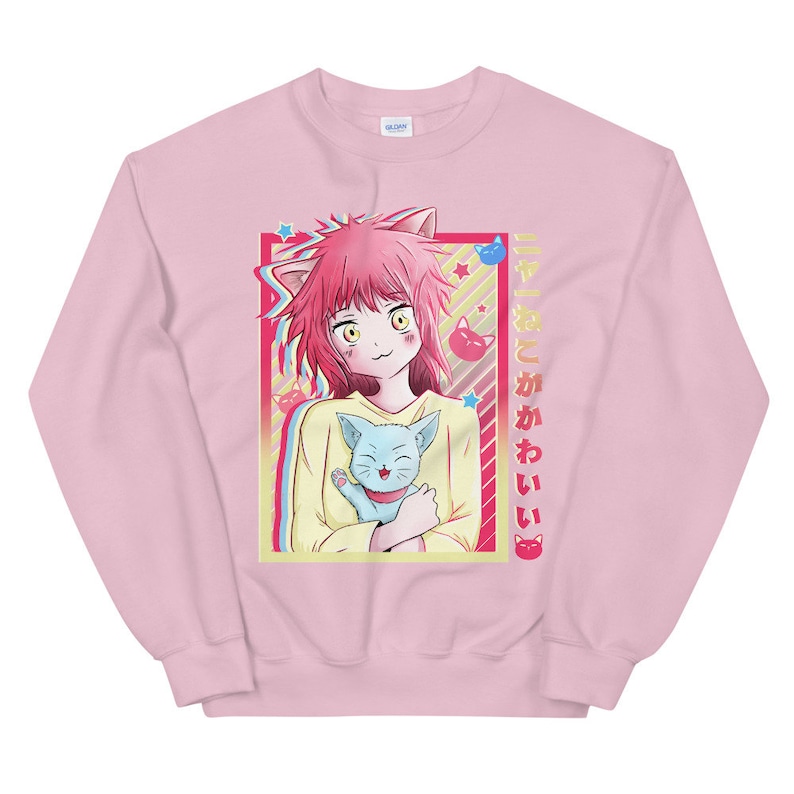 May include: Pink sweatshirt with a graphic of an anime girl with pink hair and cat ears holding a blue cat. The text "猫と かわいい" is printed on the right side of the graphic.