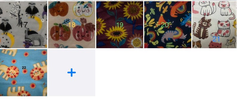 May include: A selection of fabric swatches with diverse patterns. One features owls in formal attire, another shows pumpkins with faces, and a third displays sunflowers. Other swatches include a pattern with a cat and a rainbow, and a pattern with cats.