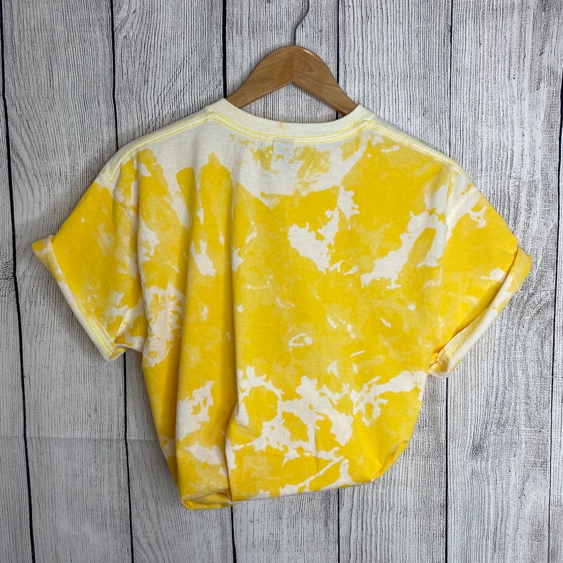 tie dye on yellow shirt