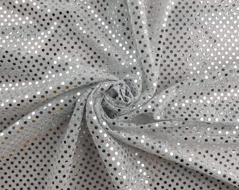 Silver paljettjerseytyg med 3 mm paljetter. Glamoröst glittrigt tyg i metervara