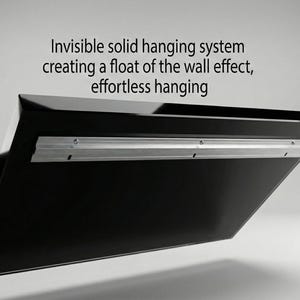 May include: A black, angled panel with a silver mounting bracket. The text reads: "Invisible solid hanging system creating a float of the wall effect, effortless hanging."