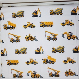 May include: White fabric with a repeating pattern of yellow construction vehicles. The vehicles include a cement mixer, a bulldozer, a crane, a dump truck, and a road roller.