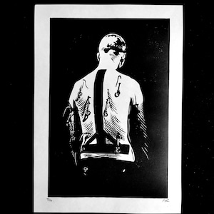 May include: Black and white woodcut print of a person's back with a series of hooks and straps attached to their body. The print is signed with the initials "PK" and numbered "4/100".