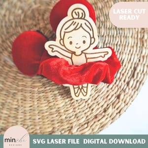 Puede incluir: Un recorte de madera cortado con láser de una bailarina con una falda de terciopelo rojo. El texto "Laser Cut Ready" está en la esquina superior derecha de la imagen.