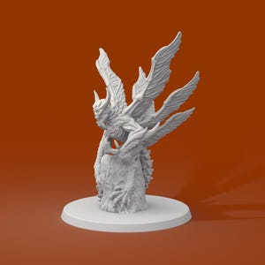May include: A white, detailed figurine of a winged creature with a horned head and outstretched wings. The figure is perched on a textured, tree-like base, set on a circular white platform. The background is a solid orange color.