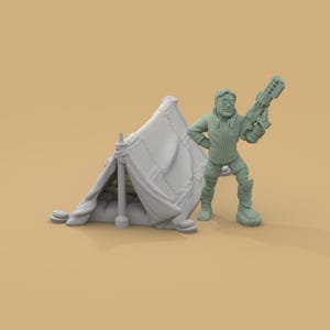 May include: A light gray miniature of a futuristic soldier with a blaster, standing next to a small tent. The soldier wears a jacket, goggles, and boots. The tent is also light gray and has a simple design.