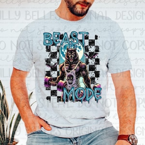 Peut inclure: Un t-shirt gris avec un motif d'un loup-garou soulevant des poids. Le motif est sur un fond à carreaux noir et blanc avec les mots "BEAST MODE" en bleu et violet.