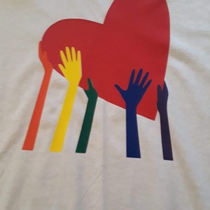Heart with rainbow hands tee