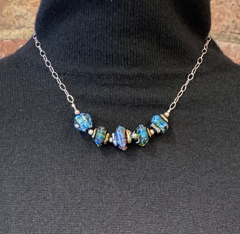 Handmade glass and sterling silver necklace with changeable colors of sky blue and emerald green