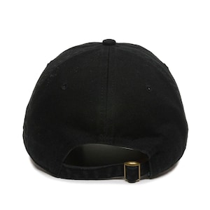 May include: A black baseball cap with a brown adjustable strap in the back.