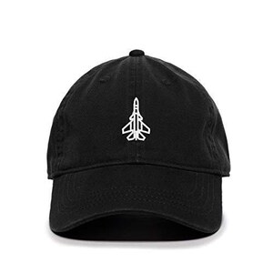 May include: A black baseball cap with a white embroidered outline of a jet fighter.